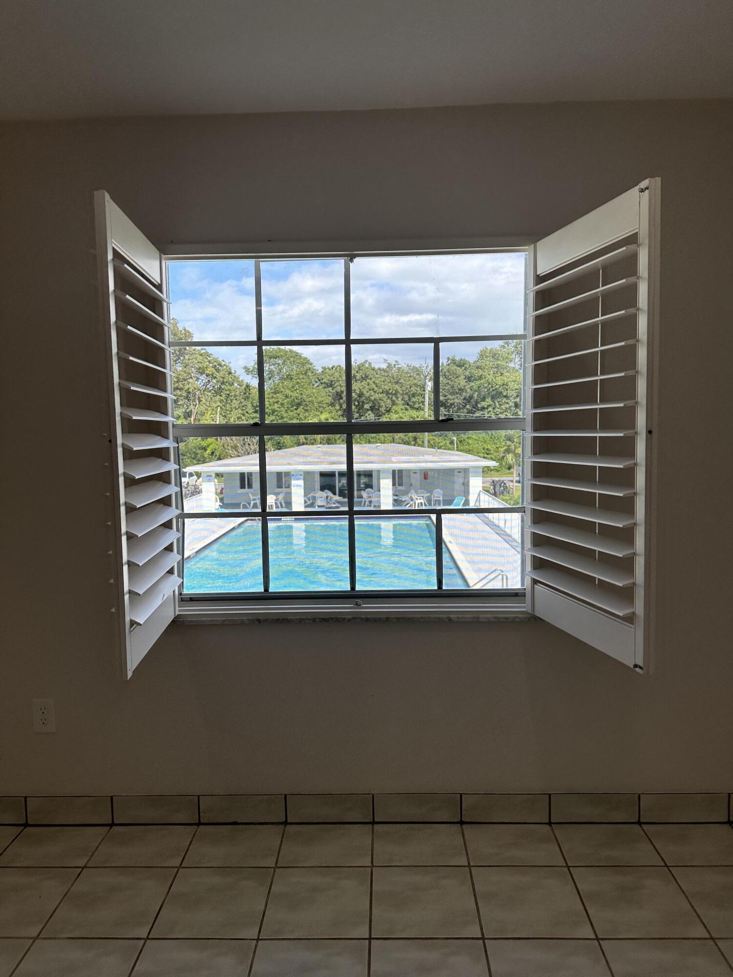 40 High Point Road, Unit D202 Tavernier, FL 33070 - Photo 9 of 28 a view of a room that has a window