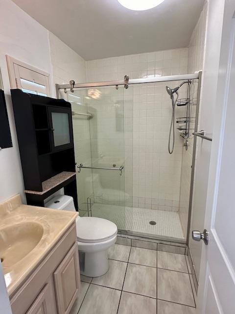40 High Point Road, Unit D202 Tavernier, FL 33070 - Photo 10 of 28 a bathroom with a sink toilet and shower