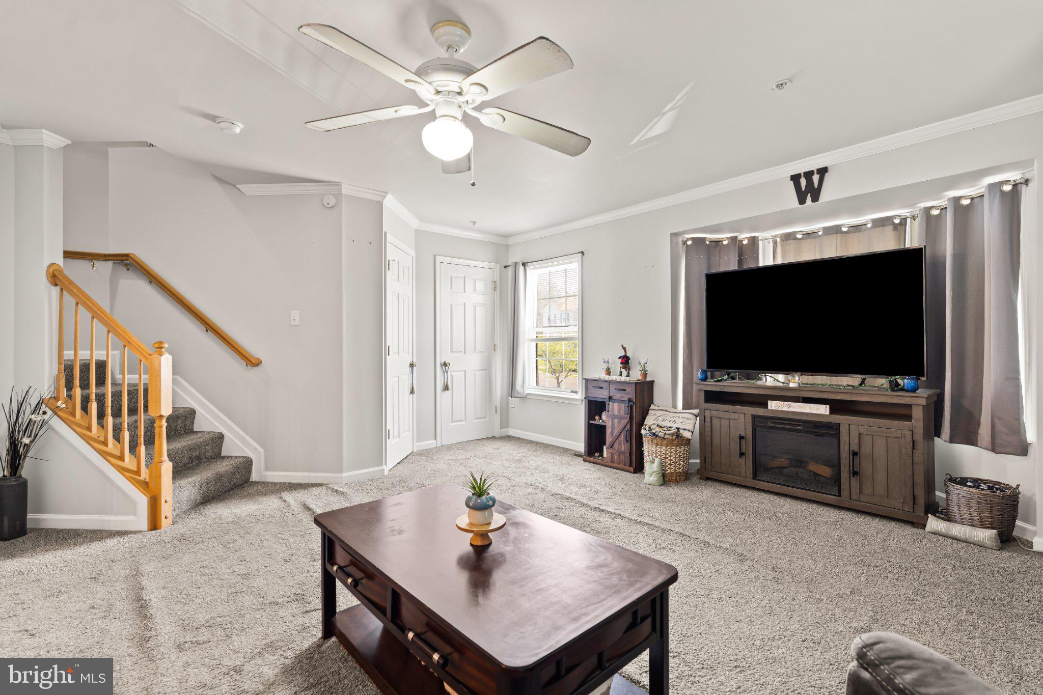 128 Sentry Ridge Smithsburg, MD 21783 - Photo 12 of 41 a living room with furniture and a flat screen tv