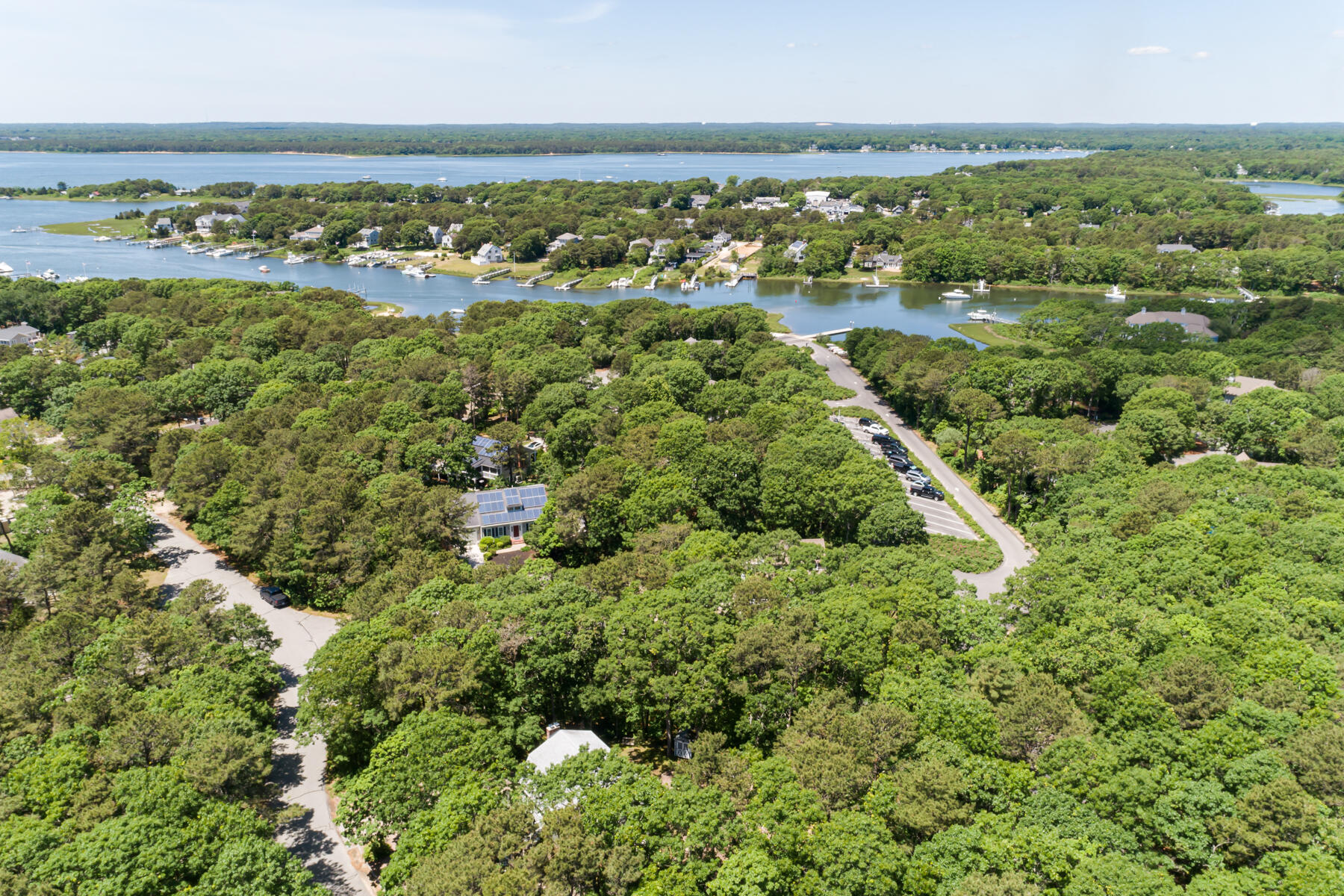 79 Neshobe Road Mashpee, MA 02649 - Photo 4 of 18 an aerial view of a houses with a yard