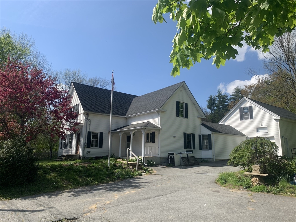 162 State Road Templeton, MA 01436 - Photo 1 of 17 a front view of a house with a garden