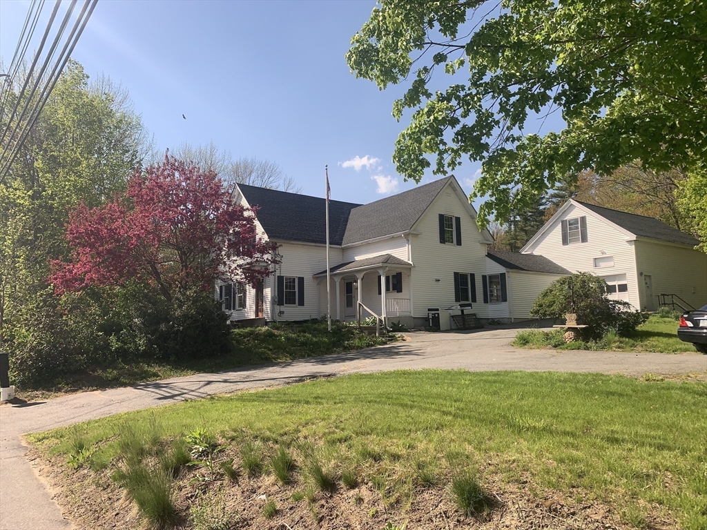 162 State Road Templeton, MA 01436 - Photo 3 of 17 a front view of a house with a yard and trees