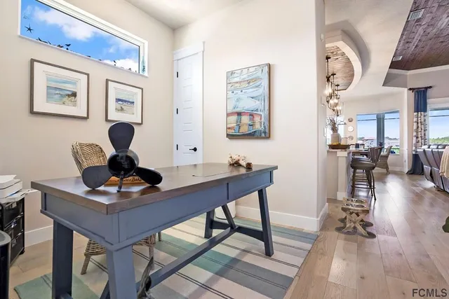 a view of a workspace with furniture