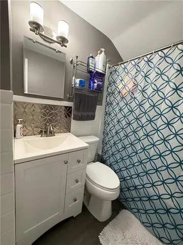 a bathroom with a sink and a toilet