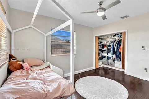 a picture of a bench and a sign