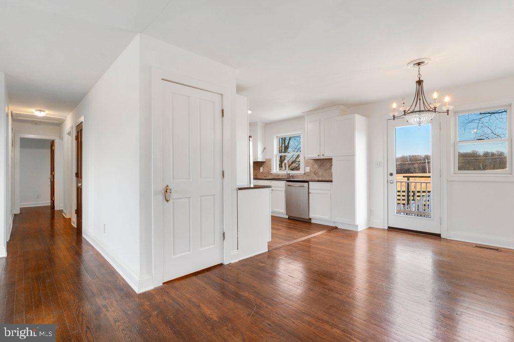 711 Ridge Road Mount Airy, MD 21771 - Photo 20 of 47 a view of a kitchen with wooden floor and electronic appliances