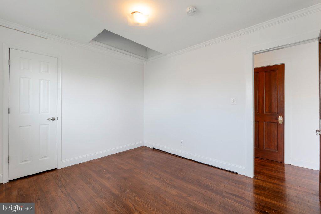 711 Ridge Road Mount Airy, MD 21771 - Photo 22 of 47 a view of an empty room with wooden floor and closet