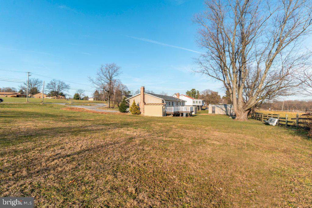 711 Ridge Road Mount Airy, MD 21771 - Photo 45 of 47 a street view with residential house