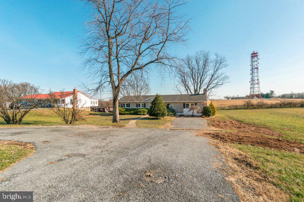 711 Ridge Road Mount Airy, MD 21771 - Photo 5 of 47 a view of a town with large trees