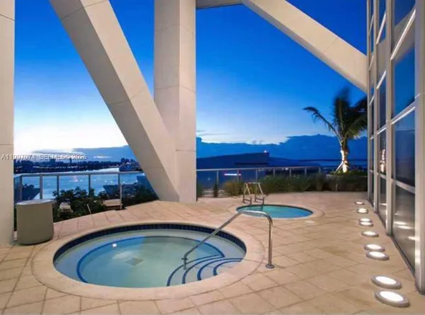 a view of balcony with outdoor seating