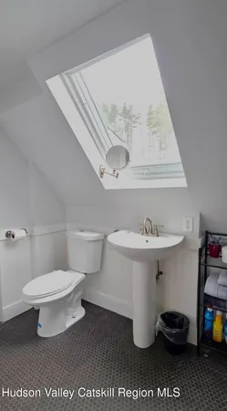 a view of balcony with wooden fence