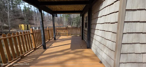 a view of outdoor space and wooden deck