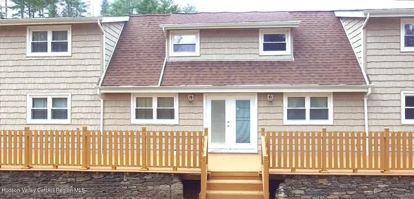 a view of an entryway with couches
