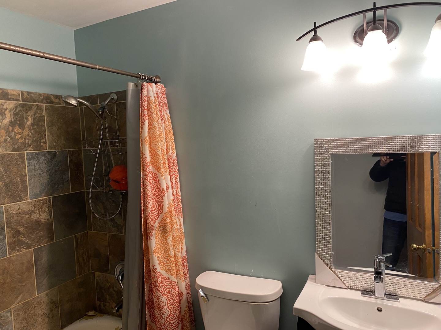 525 Northgate Road Lindenhurst, IL 60046 - Photo 8 of 10 a bathroom with a sink toilet and shower