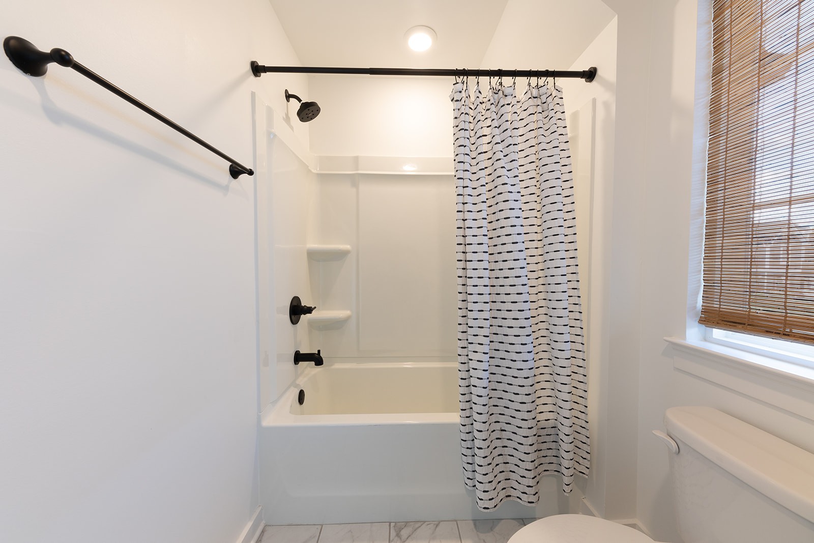 2000 Farm Street Mount Juliet, TN 37122 - Photo 23 of 34 a bathroom with a bathtub and a shower