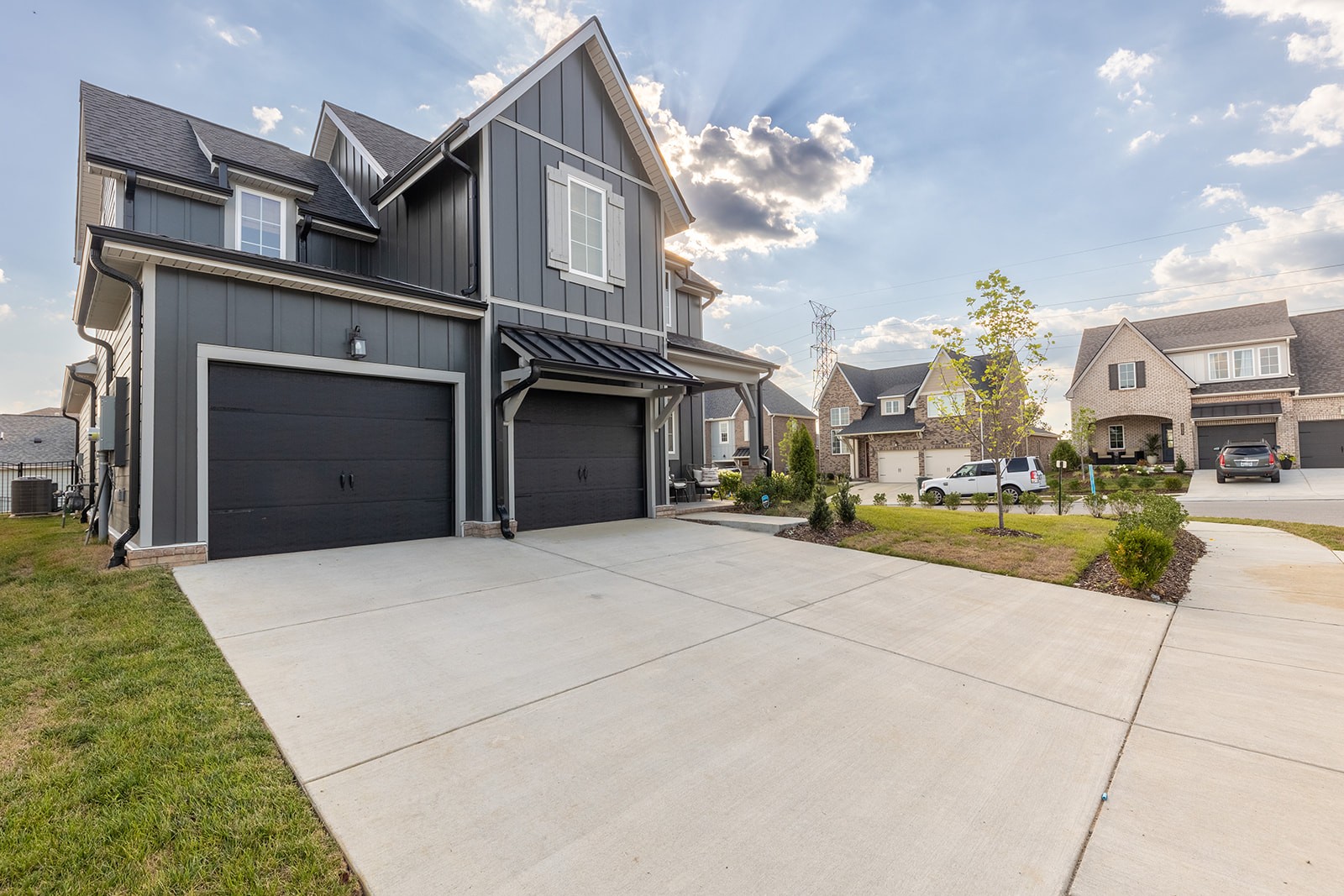 2000 Farm Street Mount Juliet, TN 37122 - Photo 3 of 34 a front view of a house with a yard and garage