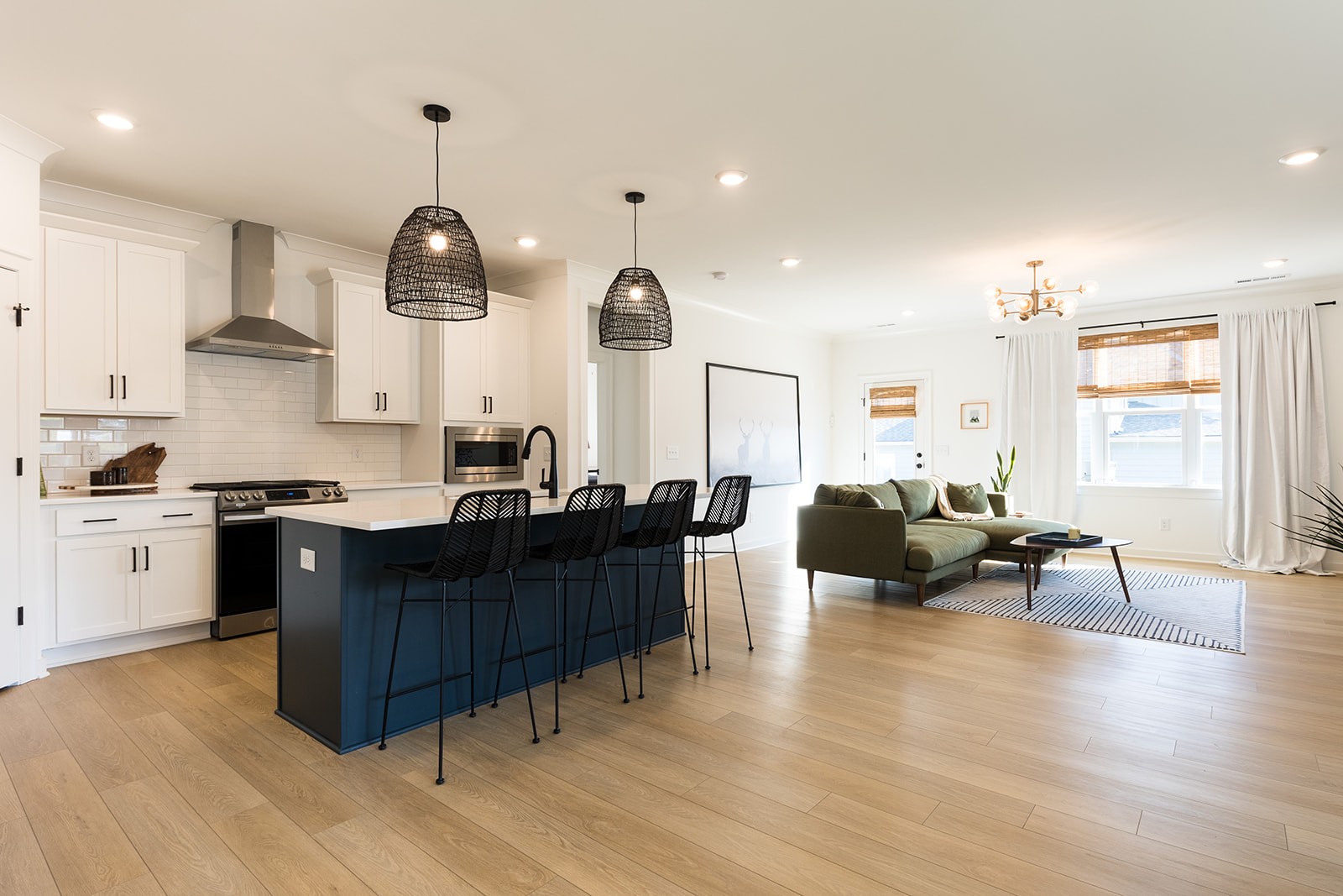 2000 Farm Street Mount Juliet, TN 37122 - Photo 4 of 34 a kitchen with a sink dishwasher a stove and a dining table with wooden floor