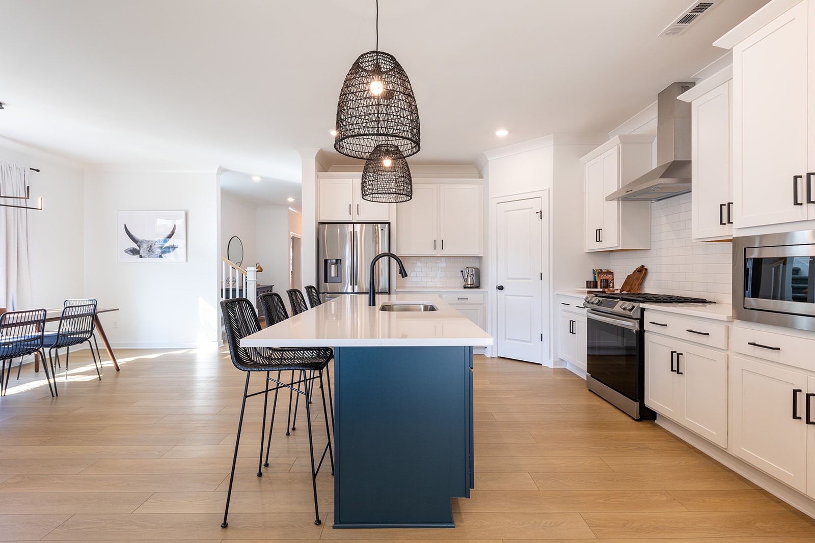 2000 Farm Street Mount Juliet, TN 37122 - Photo 7 of 34 a large kitchen with stainless steel appliances kitchen island granite countertop a sink and cabinets