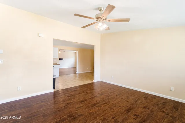 a view of a livingroom with a ceiling fan