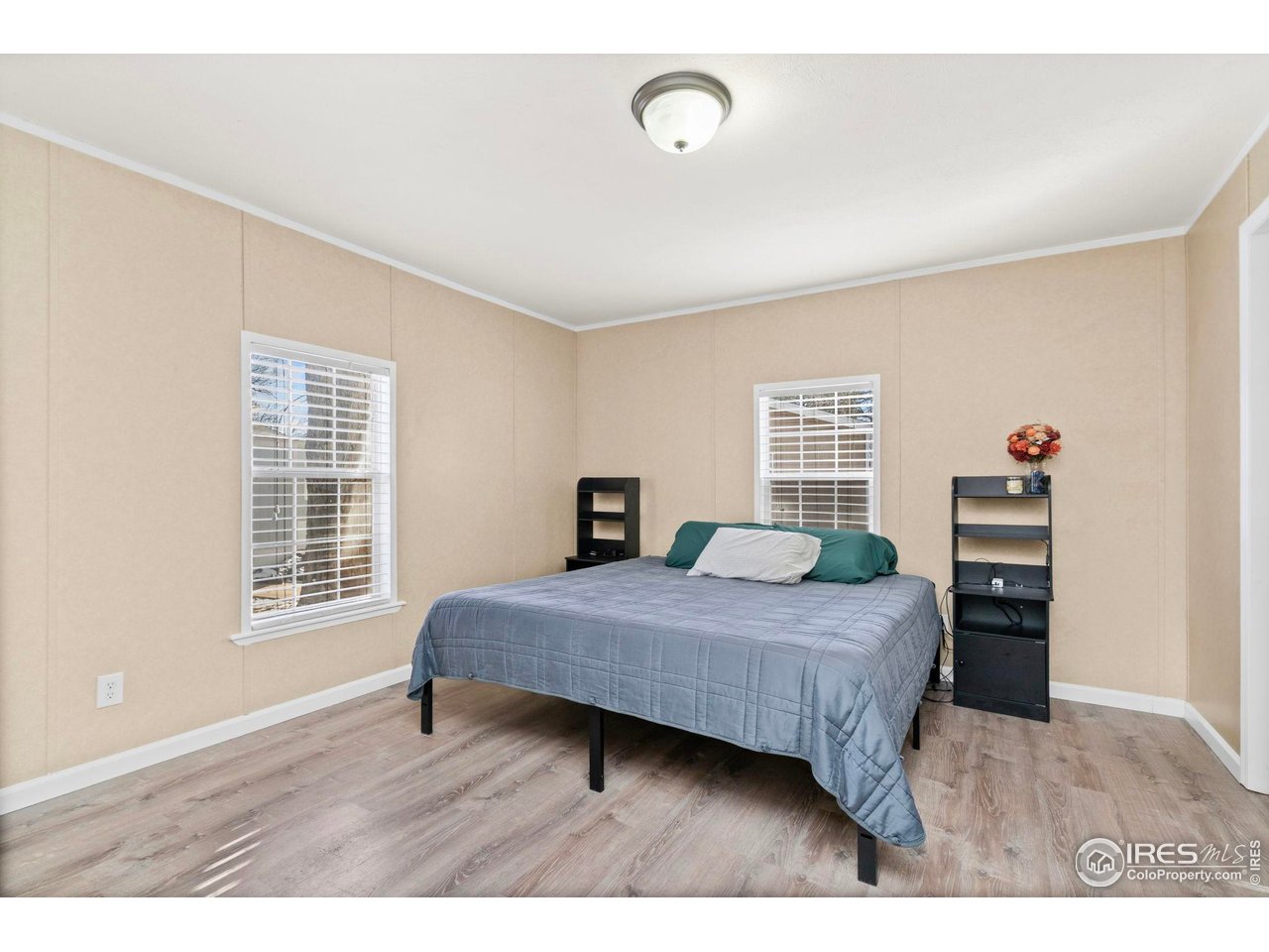 2500 East Harmony Road, Unit 105 Fort Collins, CO 80528 - Photo 15 of 21 a bedroom with a bed and window