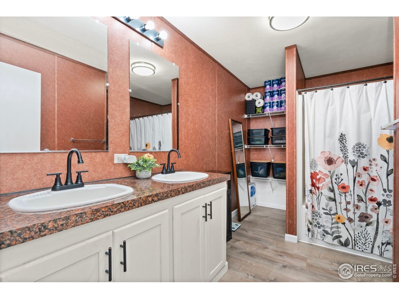 2500 East Harmony Road, Unit 105 Fort Collins, CO 80528 - Photo 16 of 21 a bathroom with a sink double vanity and a mirror