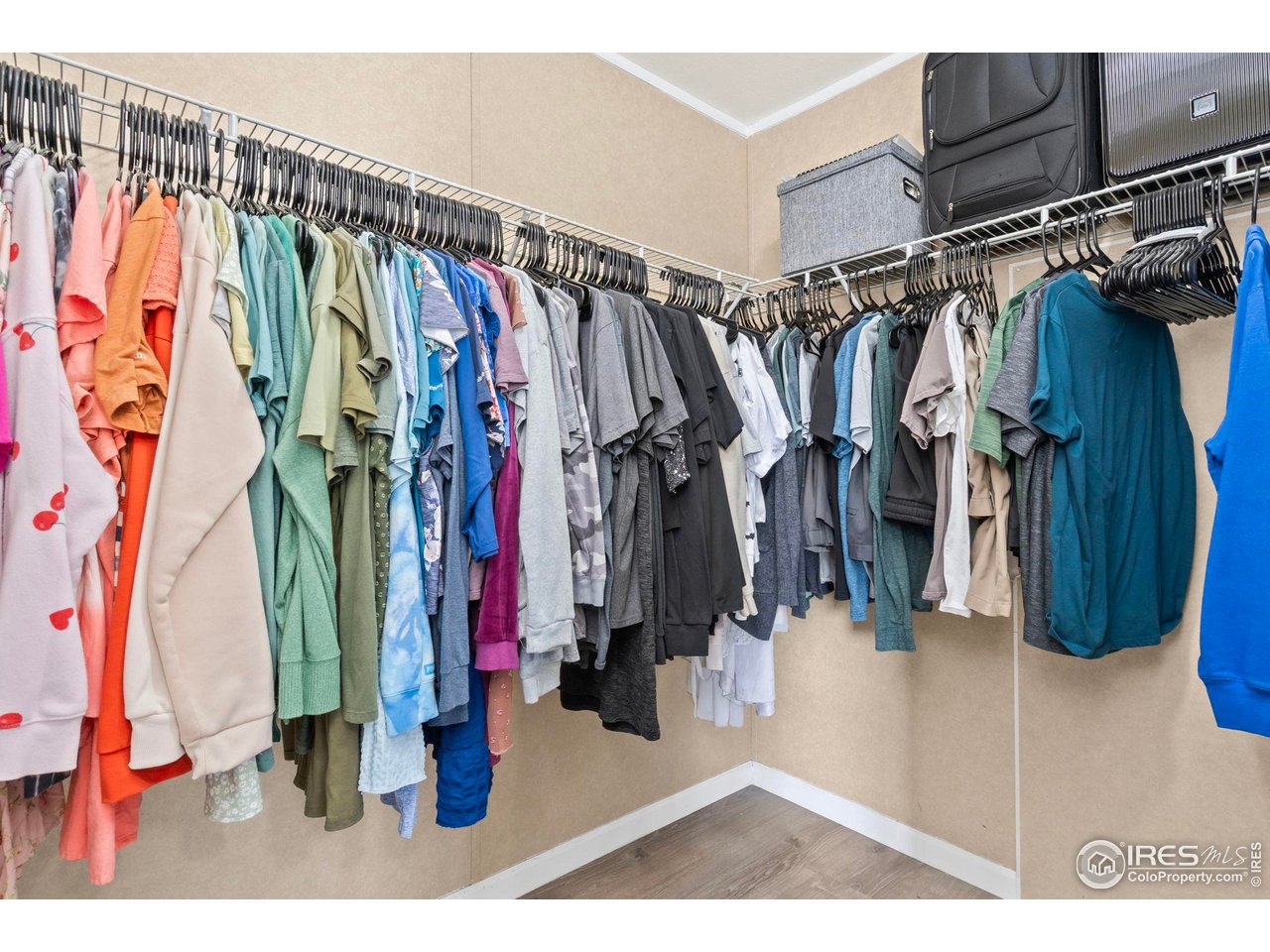 2500 East Harmony Road, Unit 105 Fort Collins, CO 80528 - Photo 17 of 21 a view of walk in closet with clothes and shoes