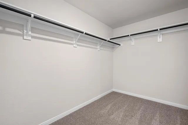 a view of a room with racks on the wall