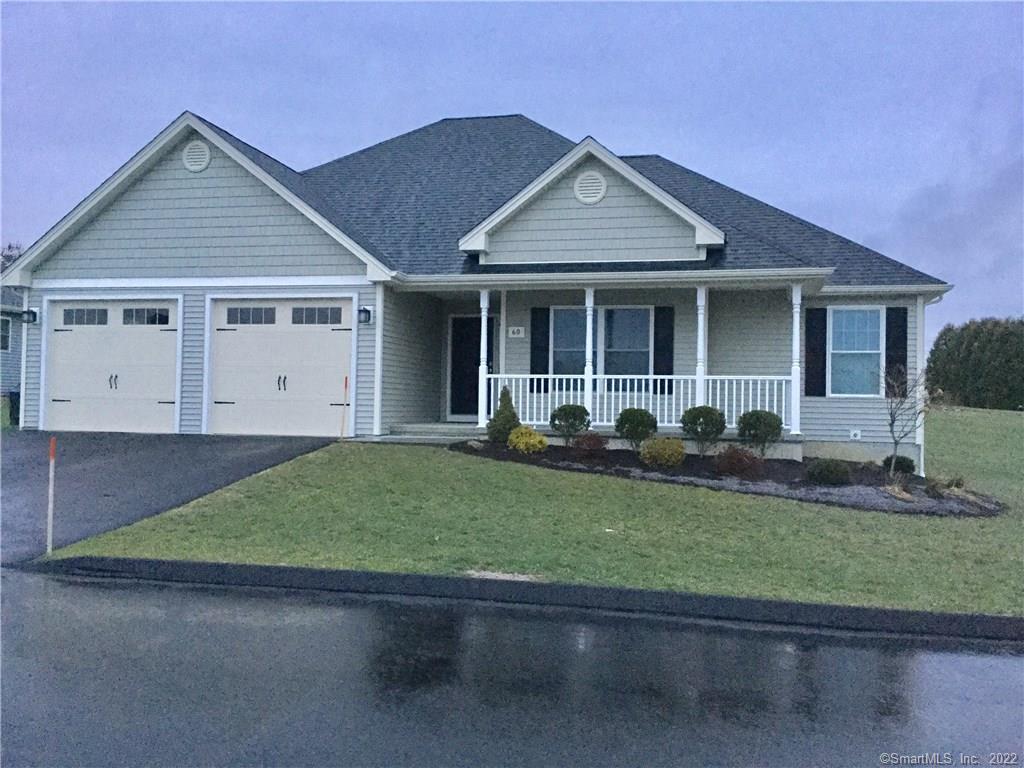 a view of a yard in front of a house