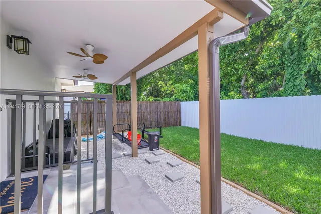 a view of a porch with a yard