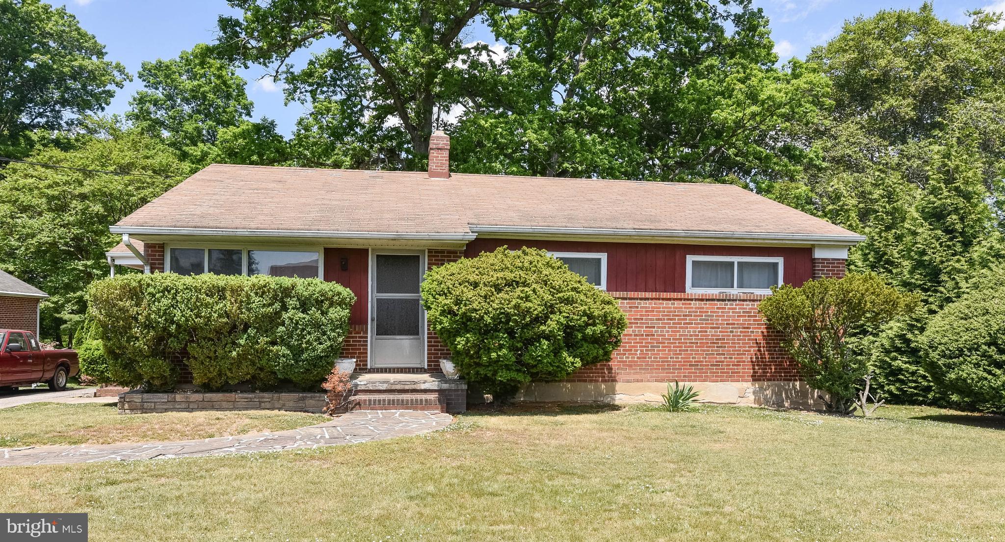 4428 Forge Road Perry Hall, MD 21128 - Photo 1 of 27 a front view of a house with garden