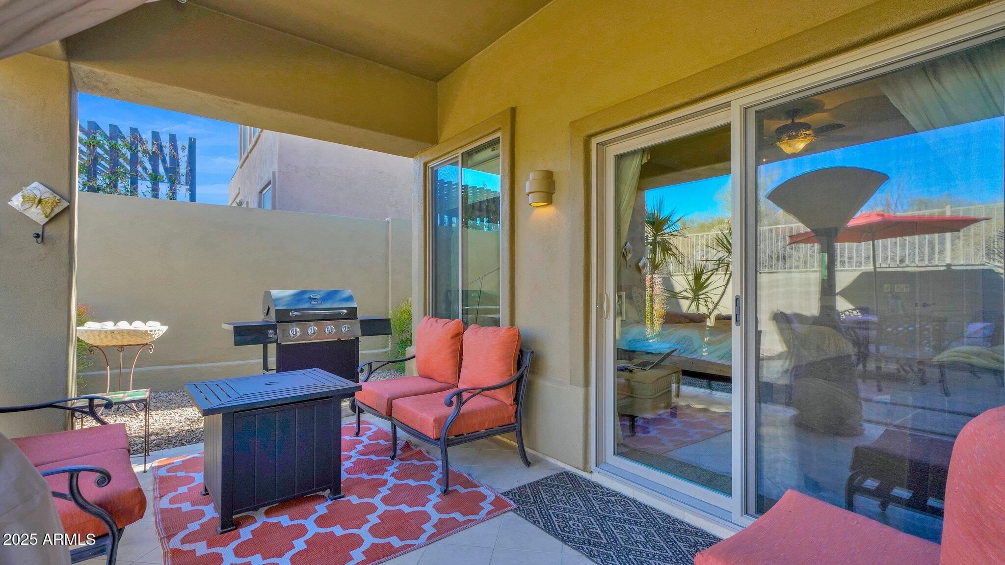 11516 East Ranch Gate Road Scottsdale, AZ 85255 - Photo 14 of 36 a backyard of a house with seating space