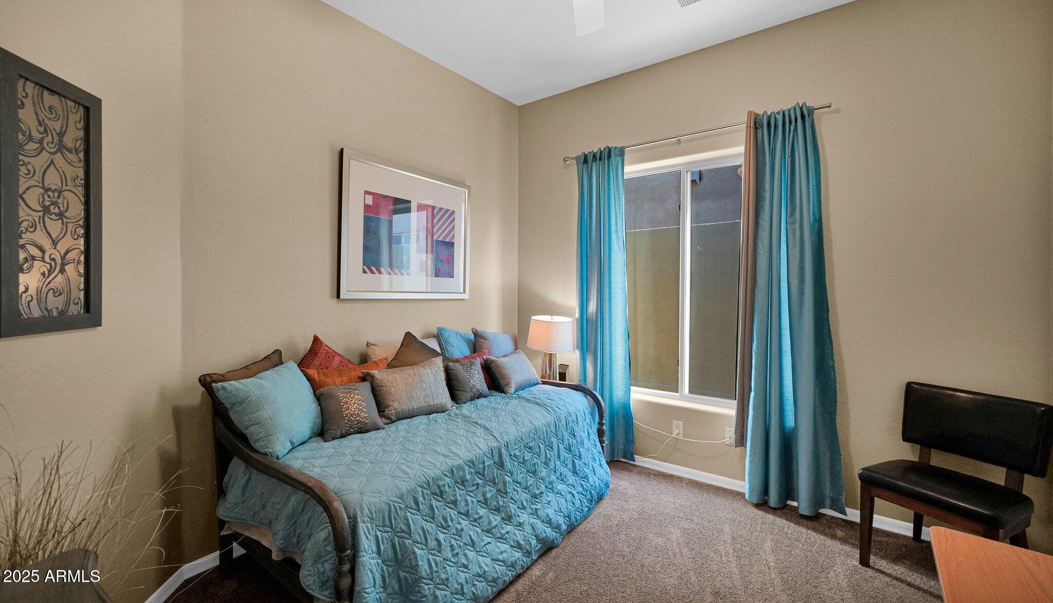 11516 East Ranch Gate Road Scottsdale, AZ 85255 - Photo 26 of 36 a living room with furniture and a window