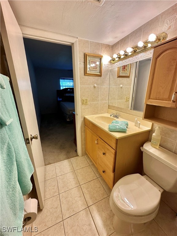 2828 Jackson Street, Unit F7 Fort Myers, FL 33901 - Photo 22 of 49 a bathroom with a sink a toilet and shower