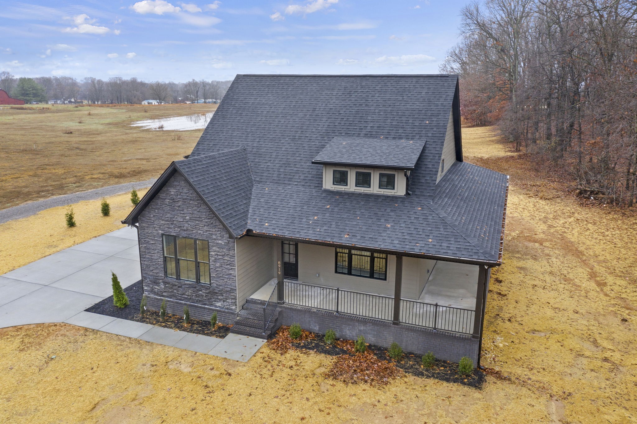 8919 Cedar Grove Road Cross Plains, TN 37049 - Photo 1 of 36 a front view of a house with a yard