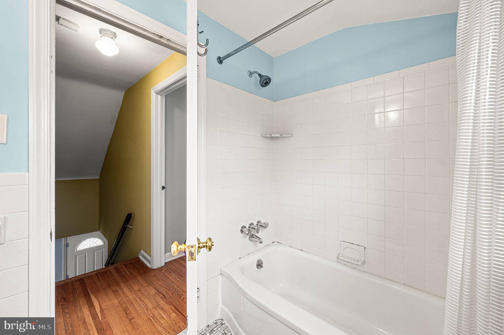 453 Claremont Road Springfield, PA 19064 - Photo 21 of 32 a bathroom with a bathtub and a shower