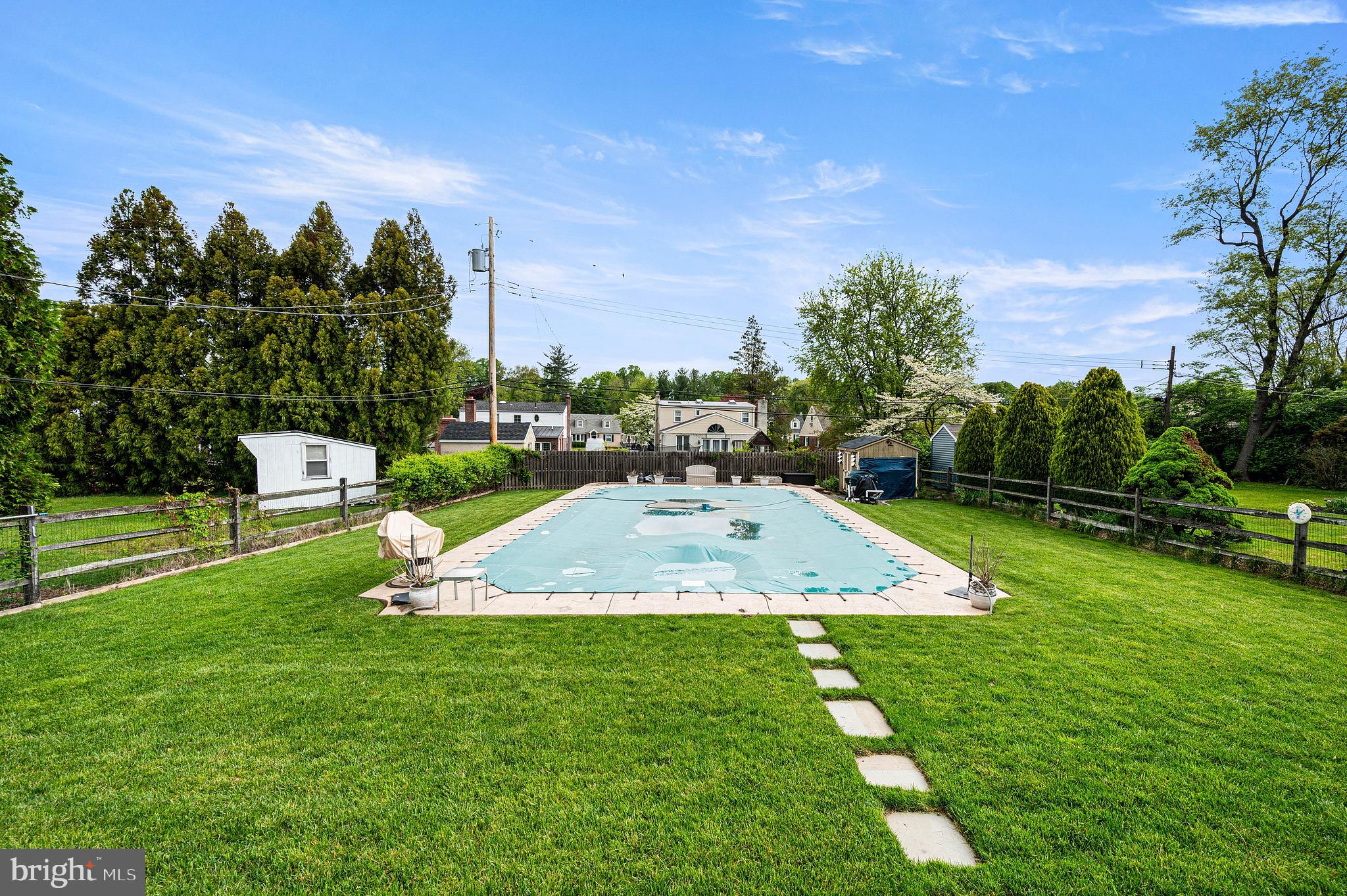 453 Claremont Road Springfield, PA 19064 - Photo 32 of 32 a view of yard with swimming pool and green space
