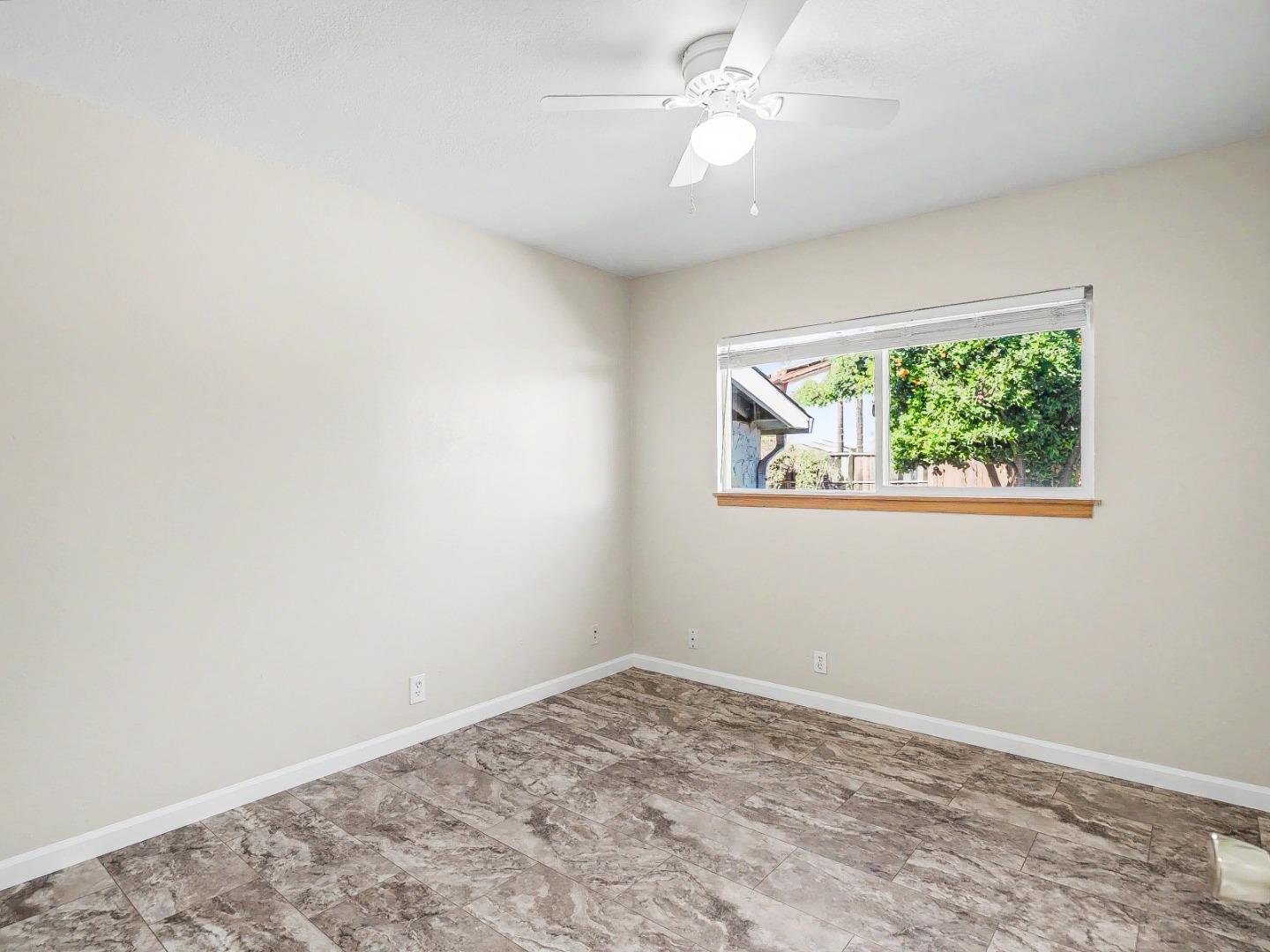 6455 Kensington Place Gilroy, CA 95020 - Photo 20 of 32 an empty room with a window