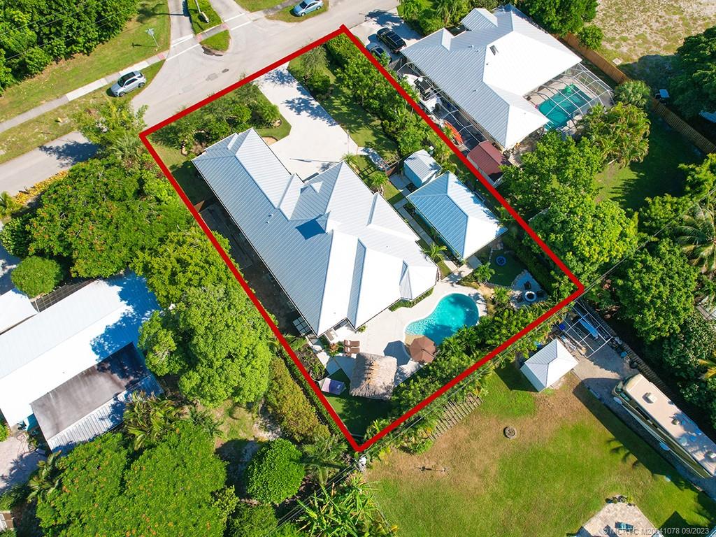 5714 Southeast Horseshoe Point Road Stuart, FL 34997 - Photo 5 of 83 an aerial view of a house