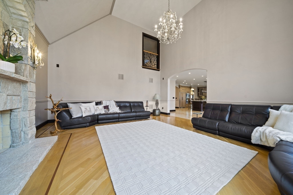 20 Boulder Road Newton, MA 02459 - Photo 15 of 42 a living room with furniture and a chandelier