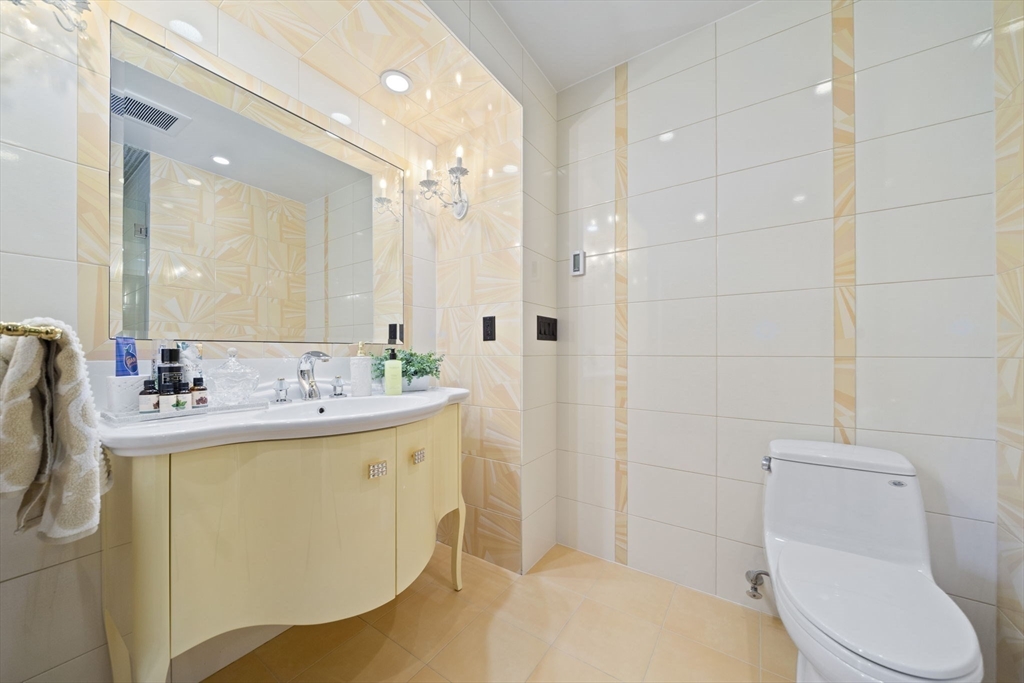 20 Boulder Road Newton, MA 02459 - Photo 25 of 42 a bathroom with a sink toilet and shower