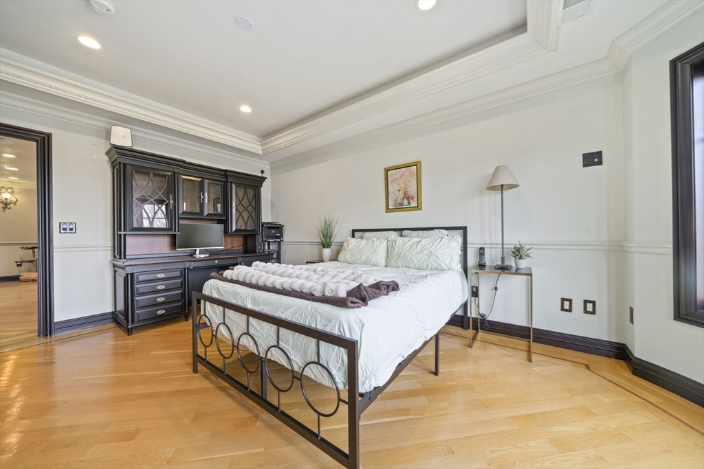 20 Boulder Road Newton, MA 02459 - Photo 27 of 42 a bedroom with a bed and a view of bathroom