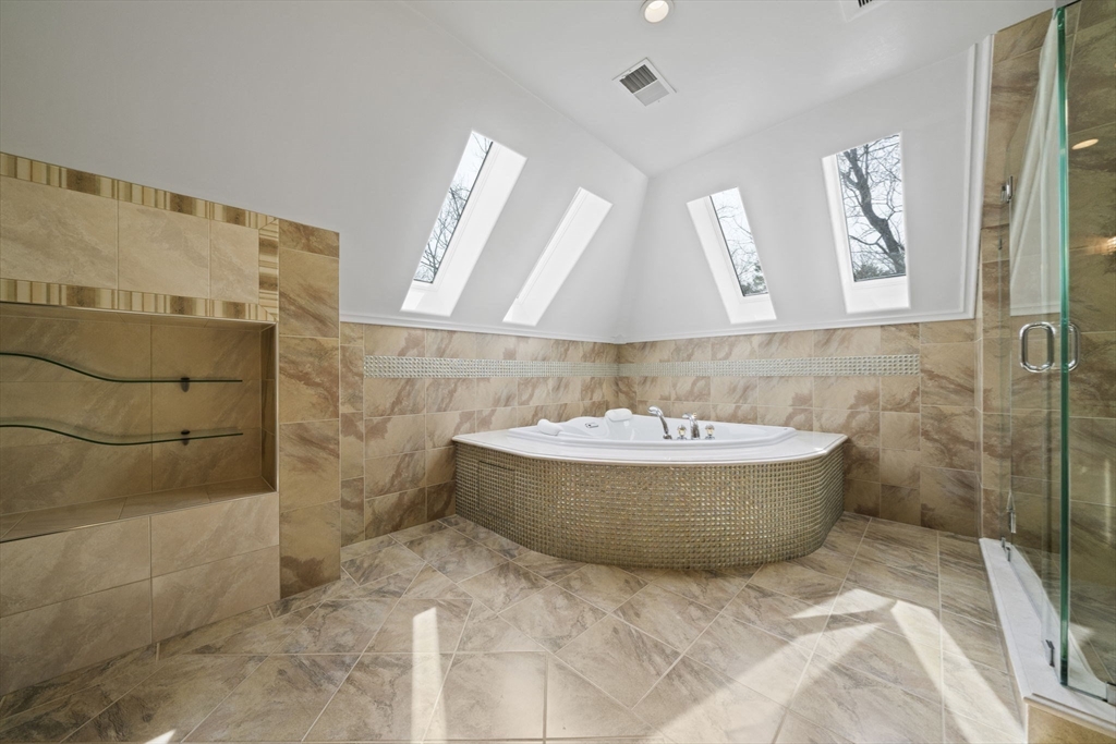 20 Boulder Road Newton, MA 02459 - Photo 32 of 42 a bathroom with a bathtub and shower