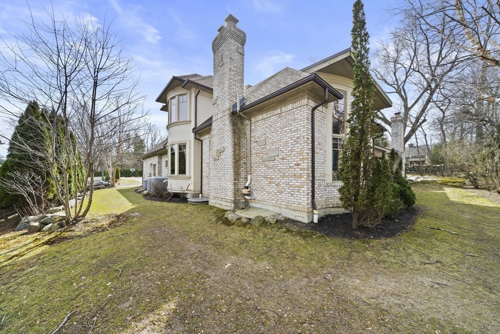 20 Boulder Road Newton, MA 02459 - Photo 37 of 42 a view of a house with a yard