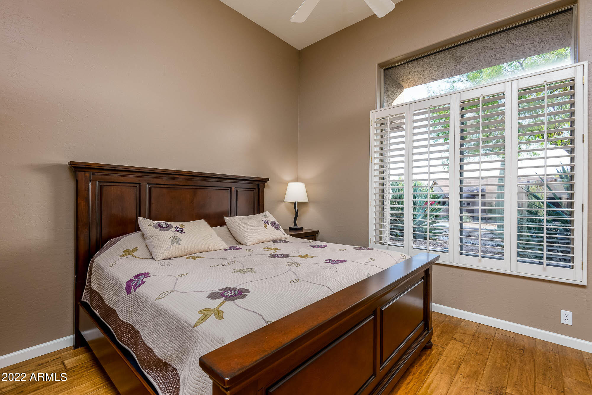 7754 East La Junta Road Scottsdale, AZ 85255 - Photo 11 of 72 a bedroom with a bed and a window