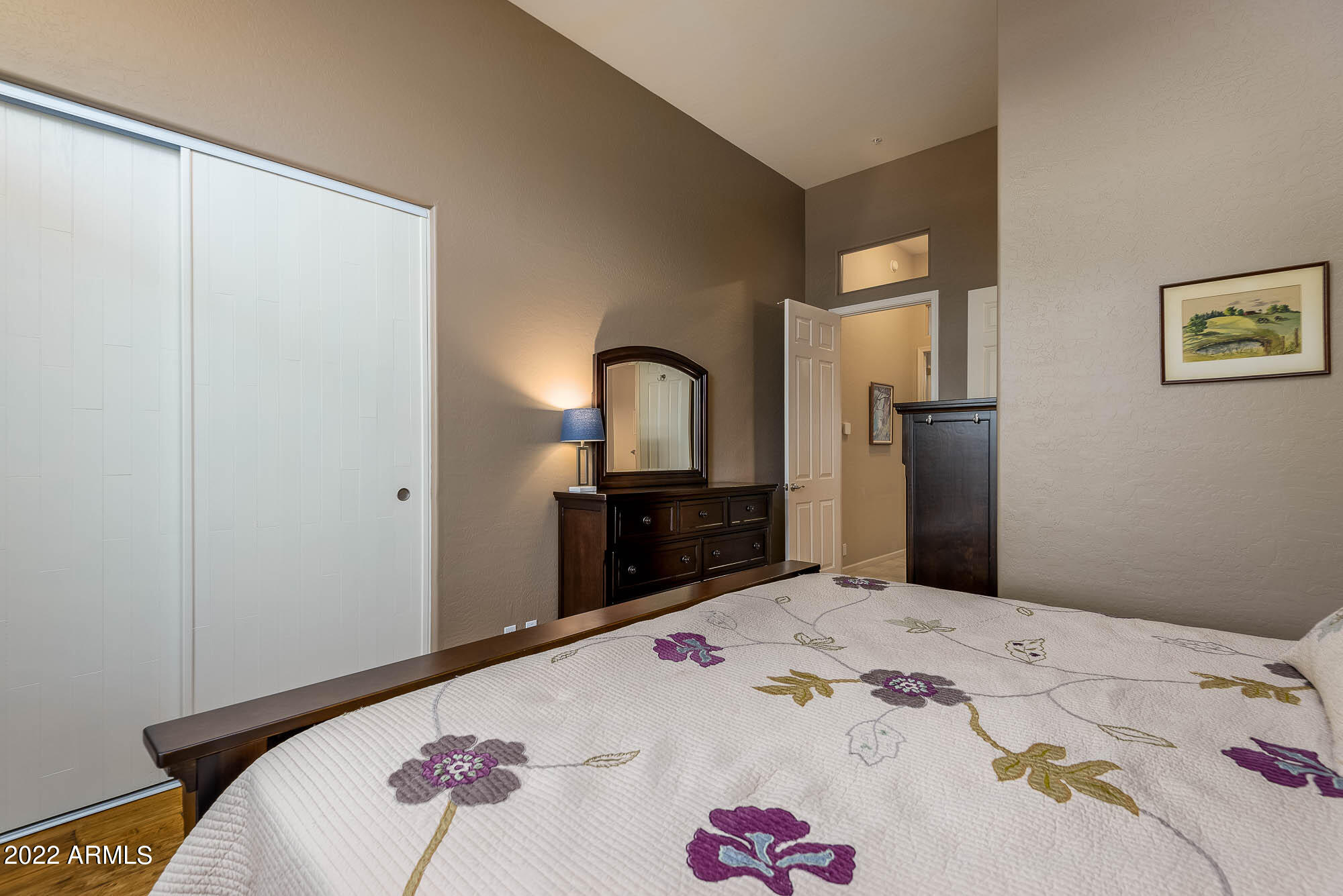 7754 East La Junta Road Scottsdale, AZ 85255 - Photo 12 of 72 a bedroom with a bed and a flat screen tv