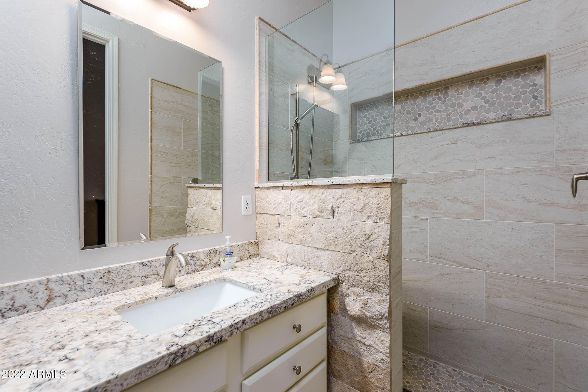 7754 East La Junta Road Scottsdale, AZ 85255 - Photo 13 of 72 a bathroom with a granite countertop sink and a mirror