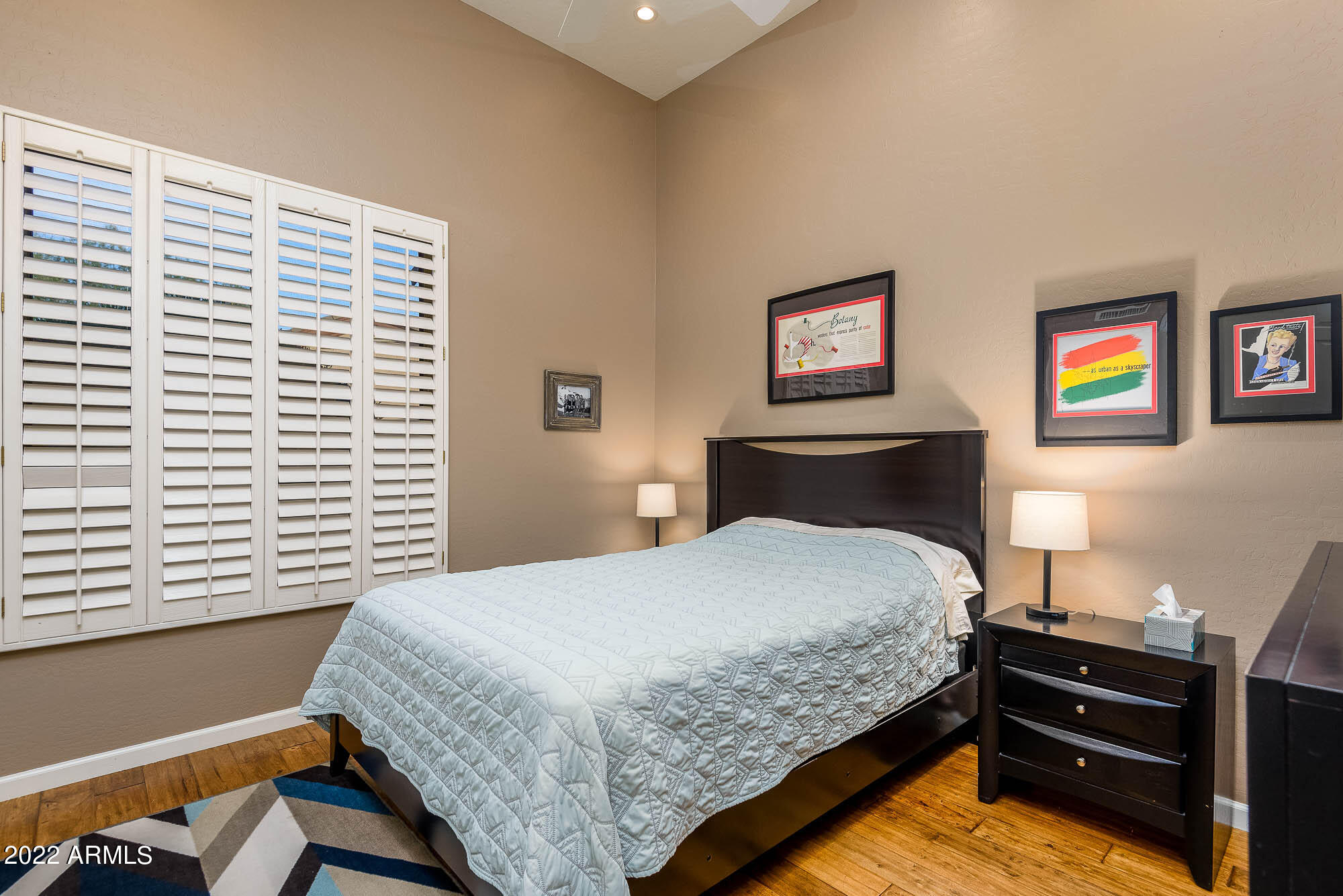 7754 East La Junta Road Scottsdale, AZ 85255 - Photo 15 of 72 a bedroom with a bed and a window