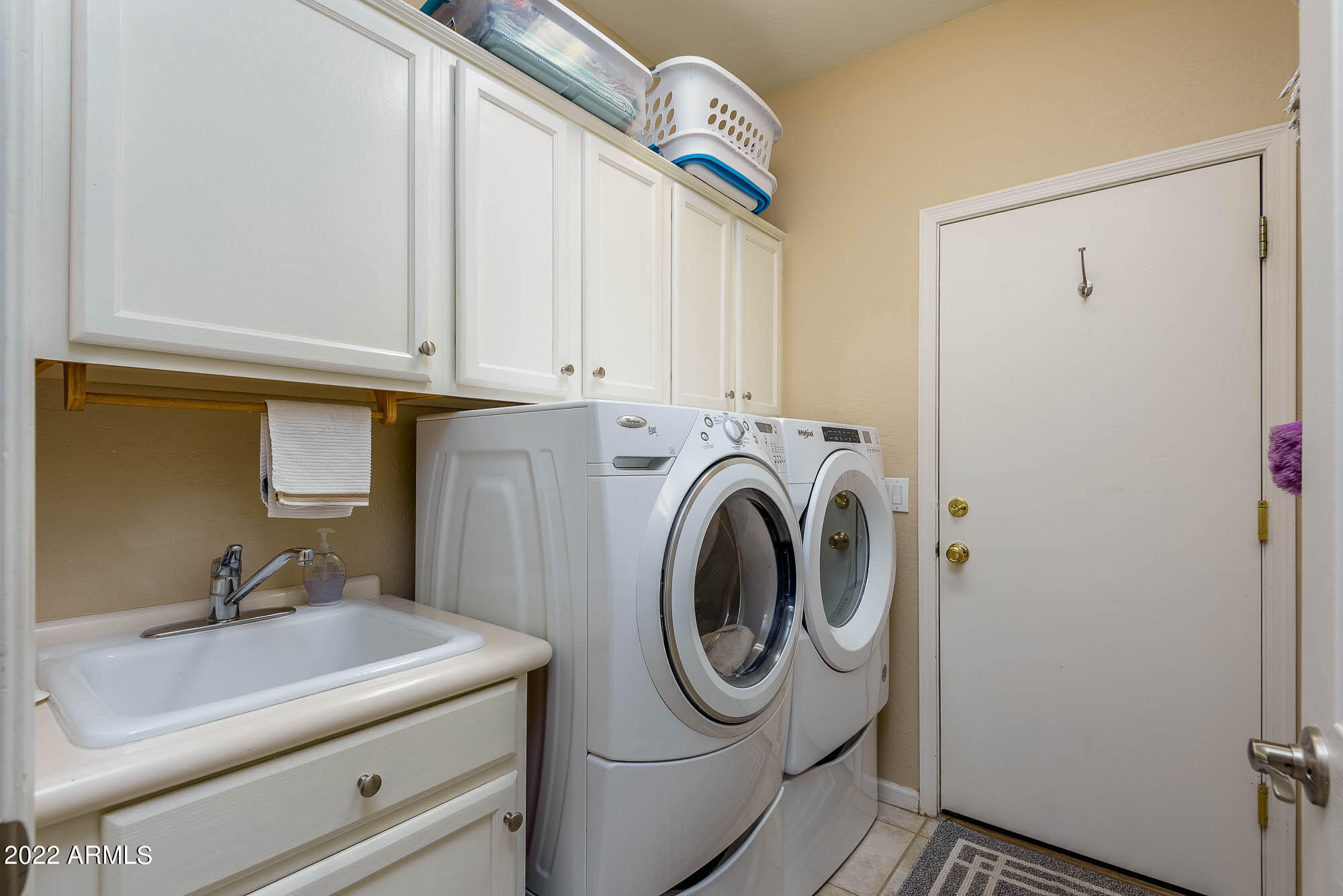 7754 East La Junta Road Scottsdale, AZ 85255 - Photo 19 of 72 a utility room with dryer and washer