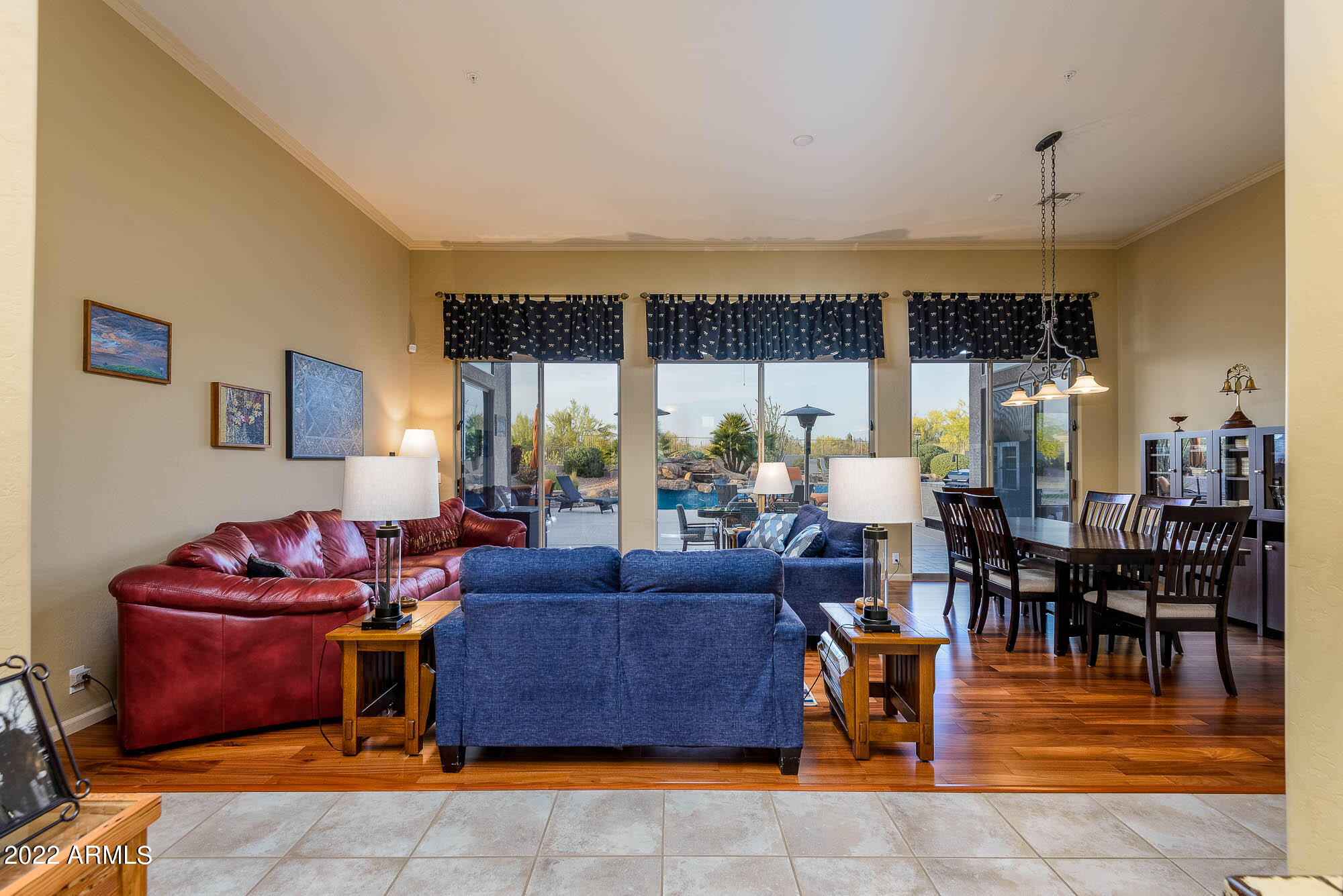 7754 East La Junta Road Scottsdale, AZ 85255 - Photo 20 of 72 a living room with fireplace furniture and a large window