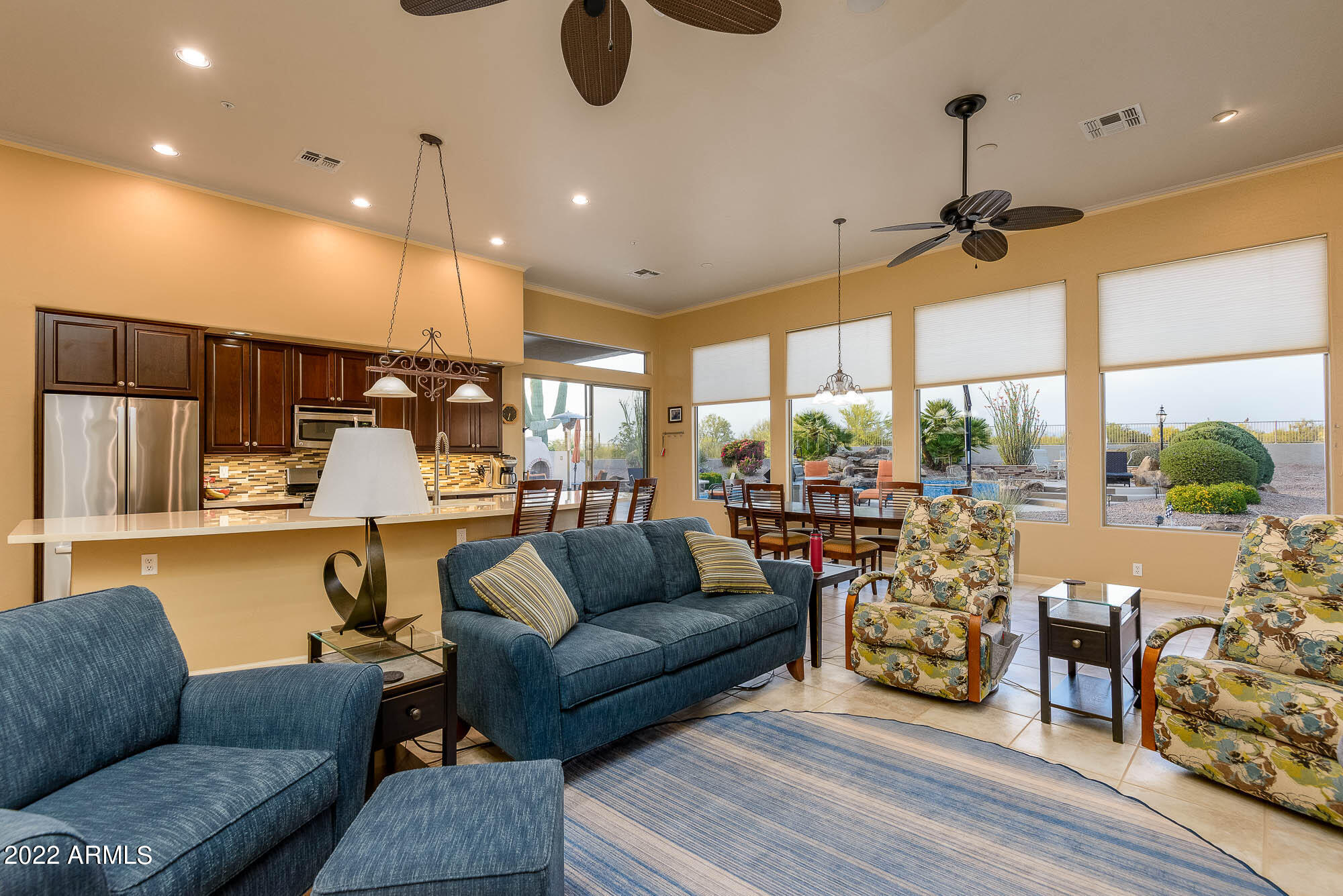 7754 East La Junta Road Scottsdale, AZ 85255 - Photo 25 of 72 a living room with furniture and a large window